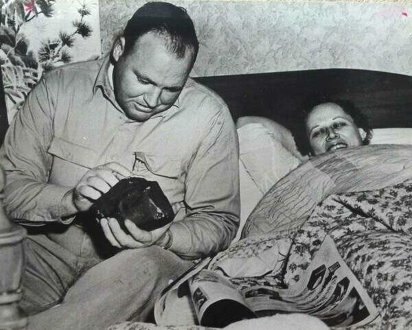 Hewlett Hodges, is examining the meteorite that hit his wife.